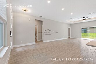 102 Orchid Ct in Poinciana, FL - Foto de edificio - Building Photo