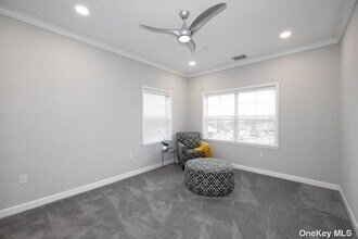 180 Atlantic Ave-Unit -E208 in Farmingdale, NY - Building Photo - Building Photo