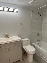 2871 N Oakland Forest Dr, Unit 102 in Oakland Park, FL - Building Photo - Building Photo