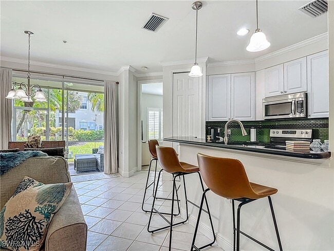 1340 Sweetwater Cove in Naples, FL - Building Photo - Building Photo