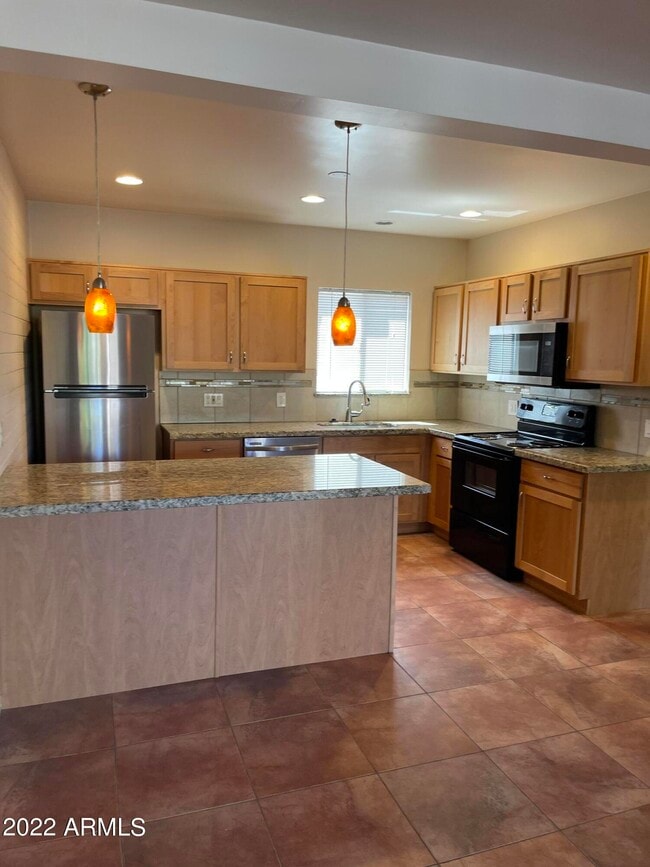 property at 6804 E 2nd St