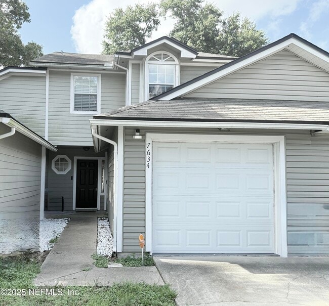 property at 7634 Rain Forest Dr W