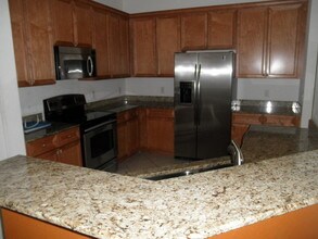477 Pacific Grove Dr-Unit -1 in West Palm Beach, FL - Foto de edificio - Building Photo