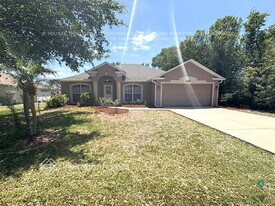 23283 Mulligan Ave in Port Charlotte, FL - Building Photo