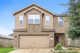 12083 Quartersawn Ln in Pinehurst, TX - Building Photo
