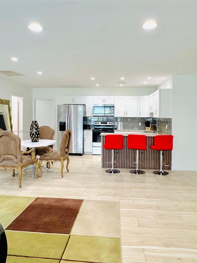 property at 120 NE 9th Ave