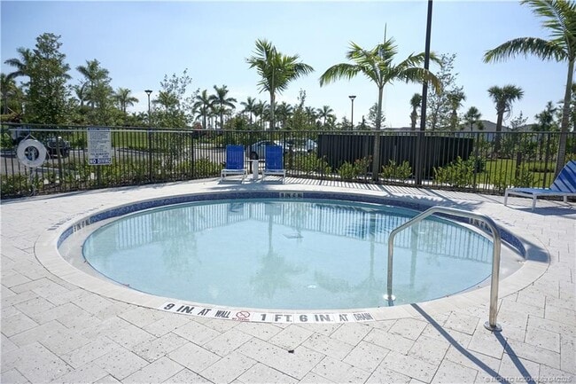 property at 14143 SW Safi Ter