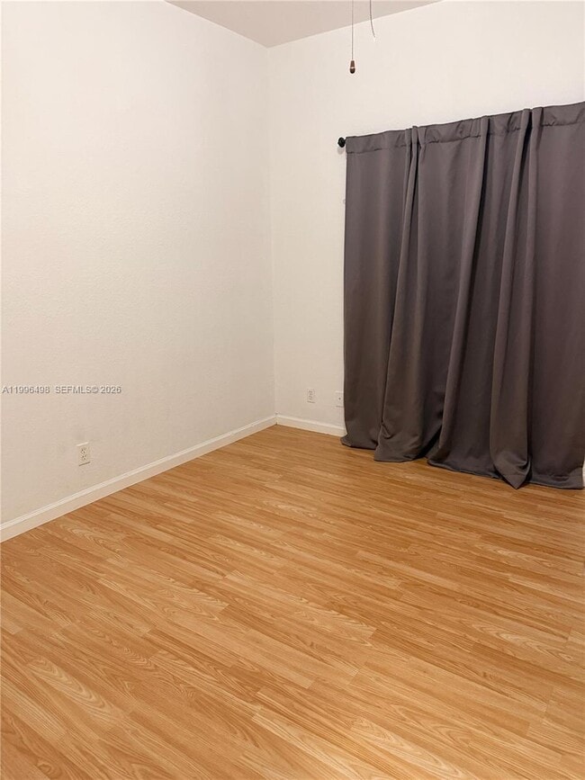 property at 9040 NW 54th St