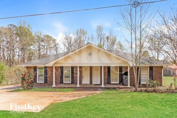 1910 Brownsville Rd in Powder Springs, GA - Building Photo