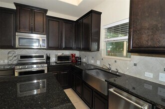 7709 Menchaca Rd in Austin, TX - Building Photo - Building Photo