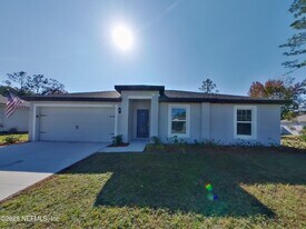 14 Rivera Ln in Palm Coast, FL - Building Photo