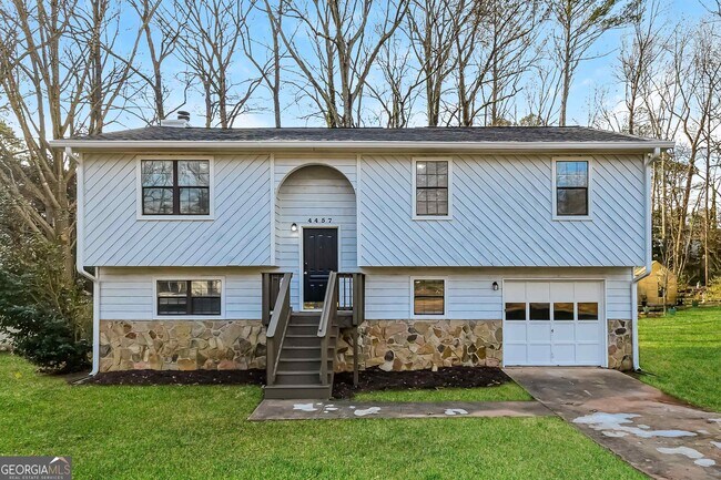 property at 4457 Woodbank Ln