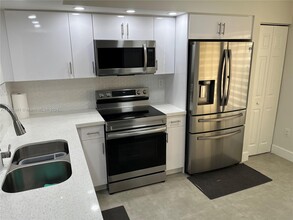 13058 SW 88th Ln-Unit -A101 in Miami, FL - Building Photo - Building Photo