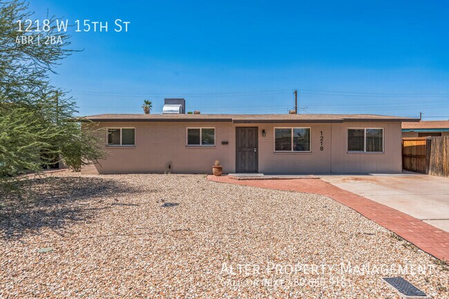 property at 1218 W 15th St