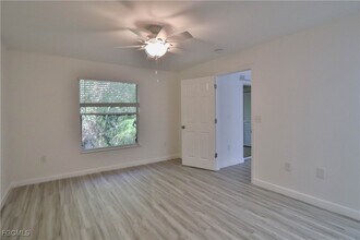 11931 Palm Bay Court in Bonita Springs, FL - Foto de edificio - Building Photo