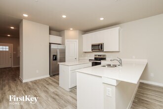 323 Aveen Path, Unit G114 in Lewisville, TX - Building Photo - Building Photo