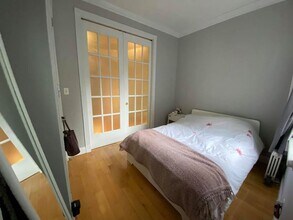 Mott Street, Unit 24 in New York, NY - Foto de edificio - Building Photo