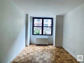 EAST 49 STREET, Unit 1H in New York, NY - Building Photo - Building Photo