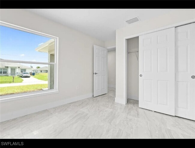 2012 East 12th Street in Lehigh Acres, FL - Building Photo - Building Photo