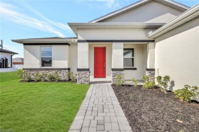 1310 NW Juanita Pl in Cape Coral, FL - Building Photo - Building Photo